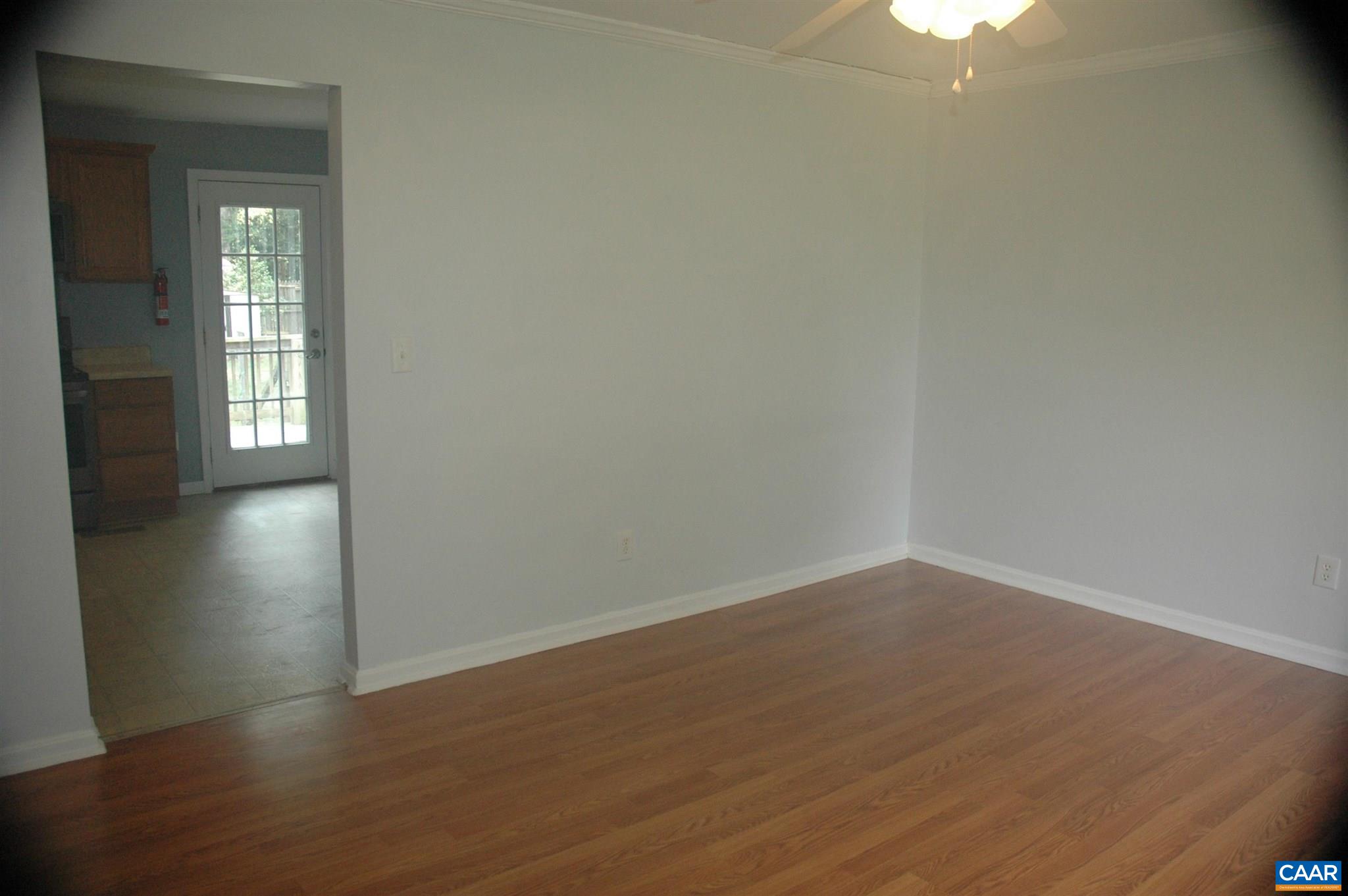 3396 Cedar Lane Road Kents Store, VA 23084 - Photo 17 of 50 wooden floor in an empty room with a window