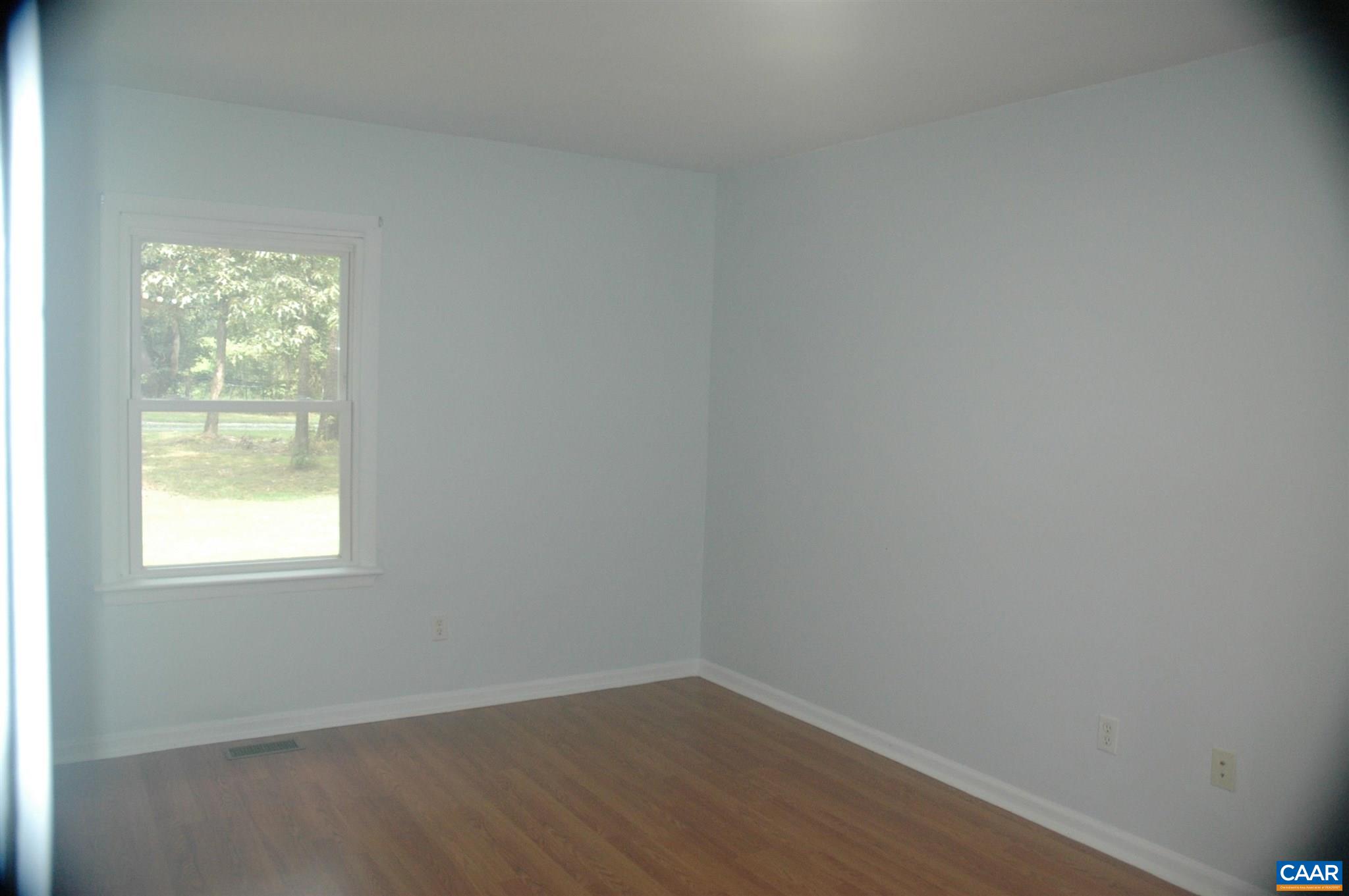 3396 Cedar Lane Road Kents Store, VA 23084 - Photo 30 of 50 an empty room with a window