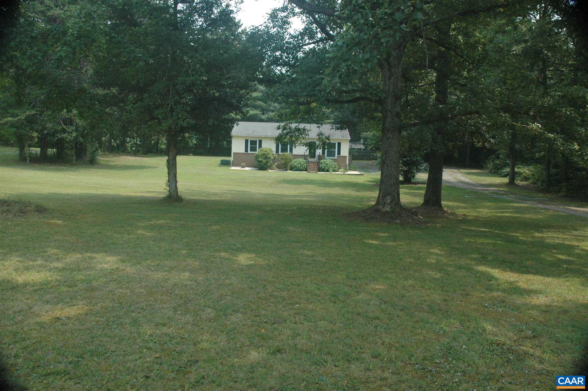 3396 Cedar Lane Road Kents Store, VA 23084 - Photo 3 of 50 a view of a house with a yard