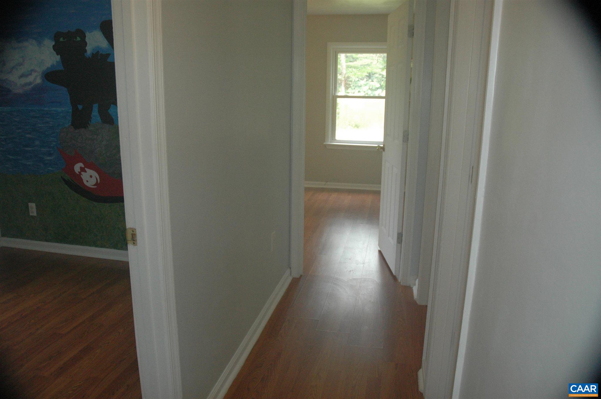 3396 Cedar Lane Road Kents Store, VA 23084 - Photo 43 of 50 a view of hallway with wooden floor