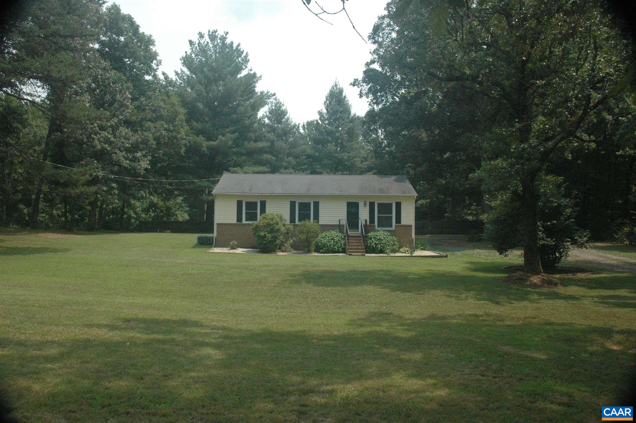 3396 Cedar Lane Road Kents Store, VA 23084 - Photo 50 of 50 a front view of a house with a garden