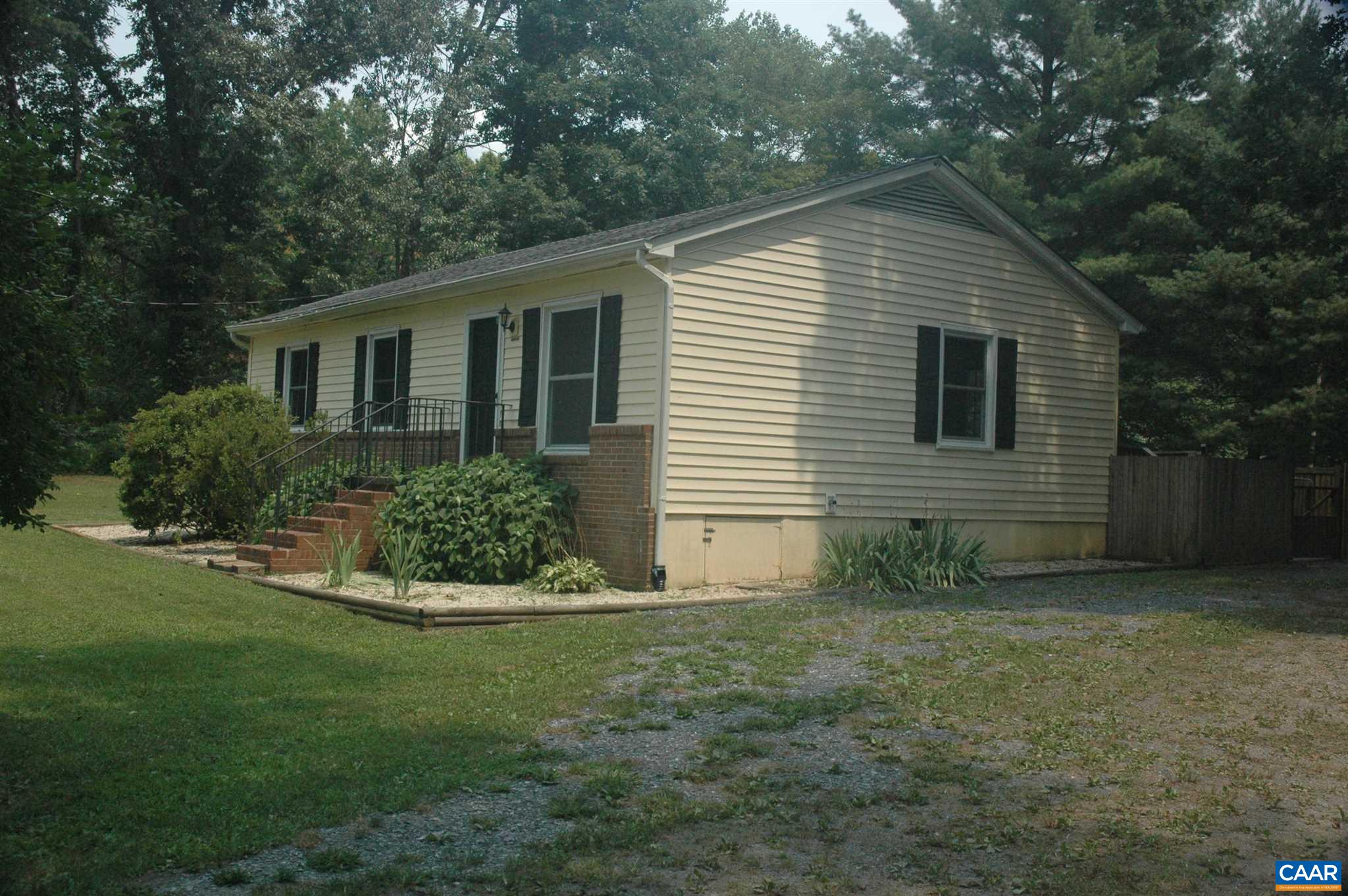 3396 Cedar Lane Road Kents Store, VA 23084 - Photo 5 of 50 a front view of house with yard and green space