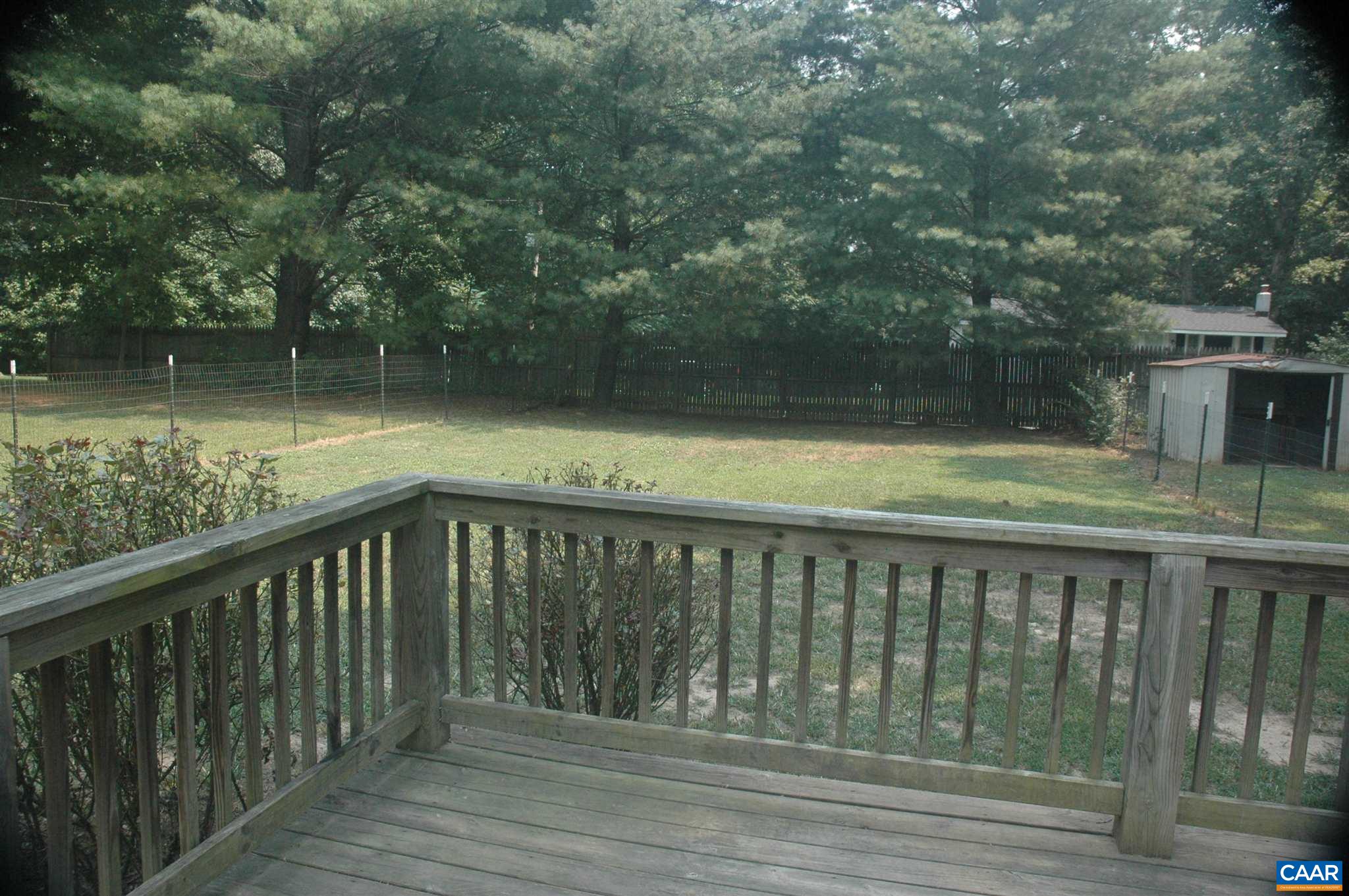 3396 Cedar Lane Road Kents Store, VA 23084 - Photo 10 of 50 a balcony with wooden floor