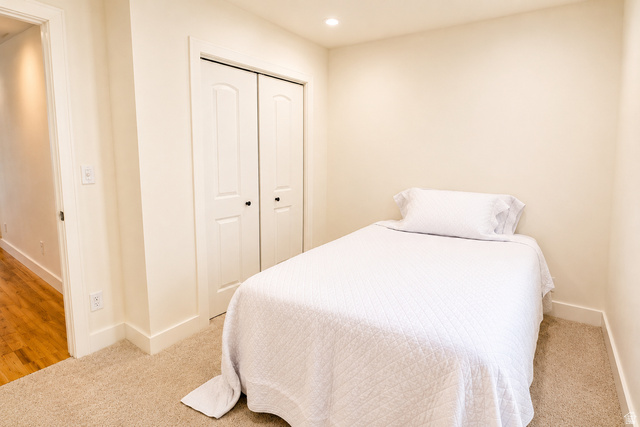 1055 North 1000 East Mapleton, UT 84664 - Photo 60 of 112 Carpeted room with a bi-fold closet and recessed lighting