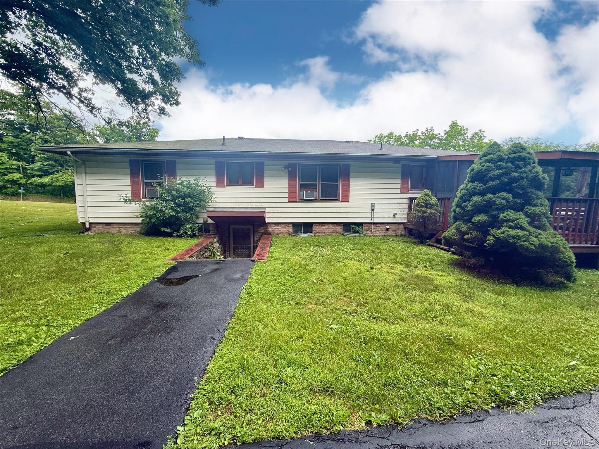646 Oak Summit Road Millbrook, NY 12545 - Photo 21 of 36 Separate entrance from u-shaped driveway for lower level dwelling