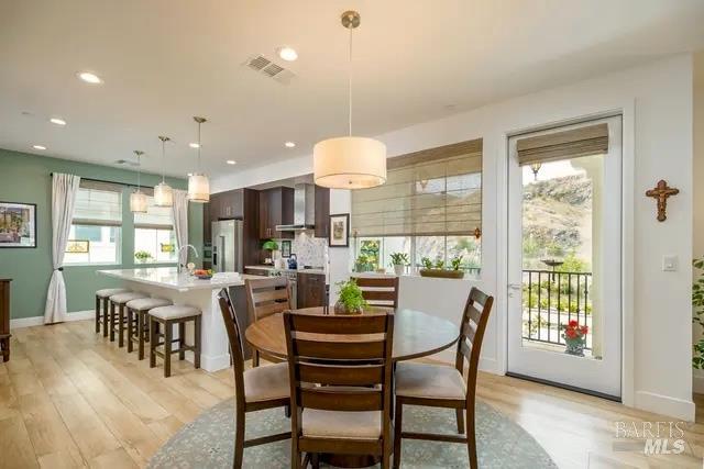715 Rockview Road Novato, CA 94949 - Photo 2 of 36 Light-filled dining area with access to the balcony.