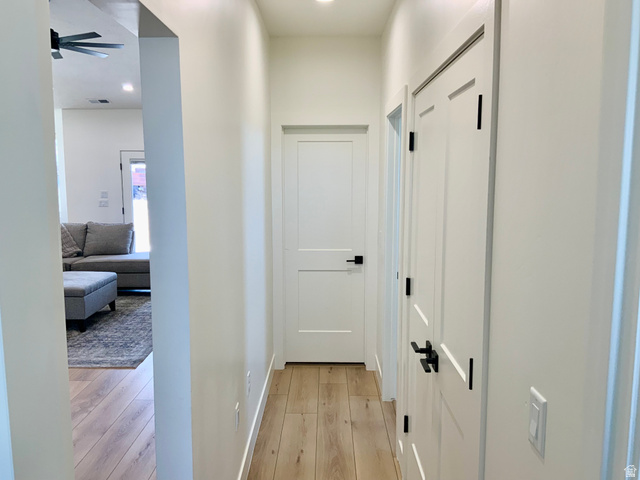 277 West 800 South Monroe, UT 84754 - Photo 23 of 46 Hallway with light wood-type flooring and recessed lighting