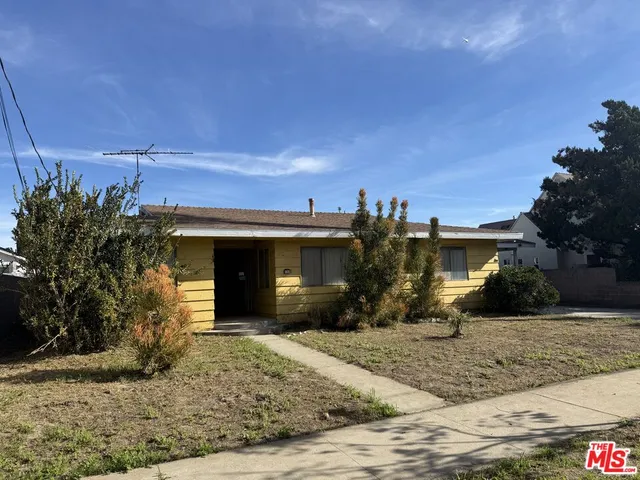a view of a house with a patio