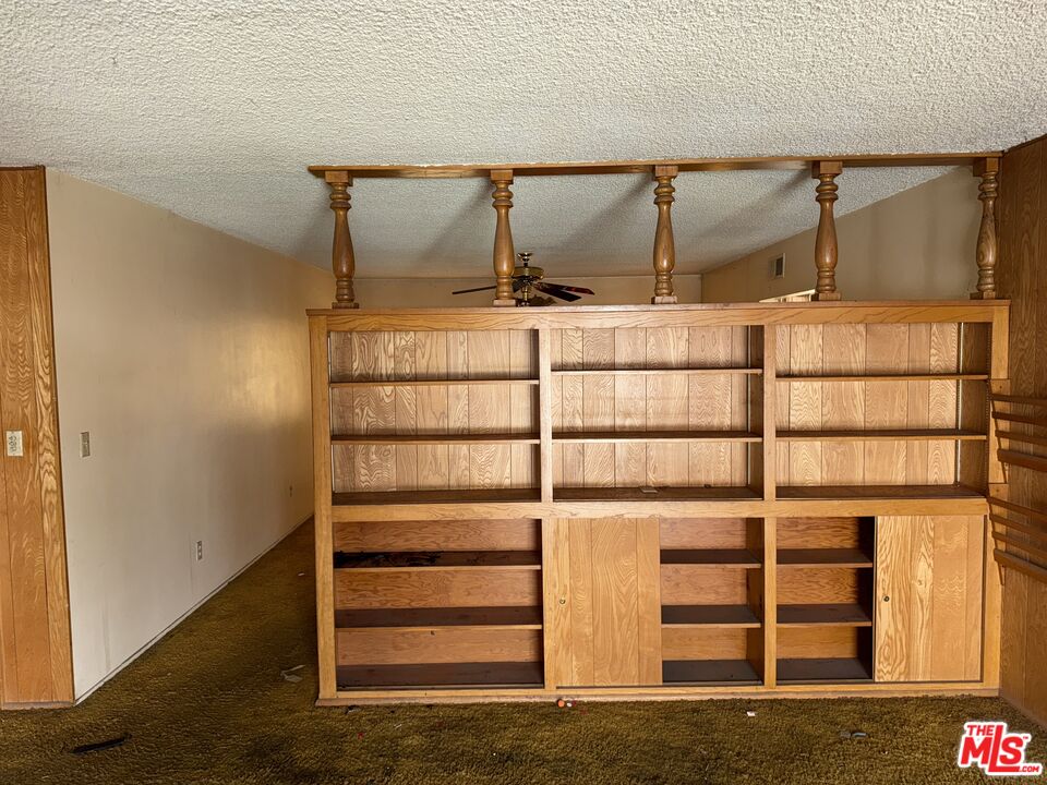 9264 Cayuga Avenue Sun Valley, CA 91352 - Photo 5 of 10 a view of walk in closet with empty racks