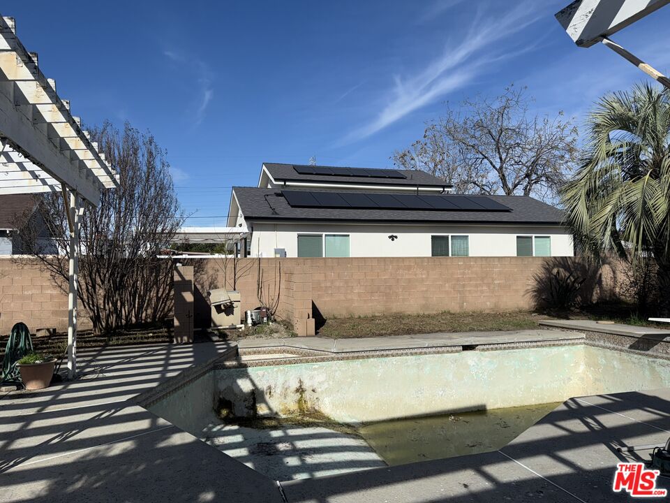 9264 Cayuga Avenue Sun Valley, CA 91352 - Photo 7 of 10 a view of a swimming pool with a patio