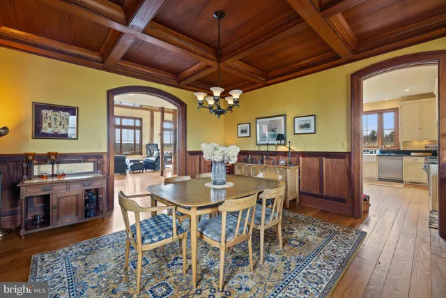 a view of a livingroom with furniture and workspace