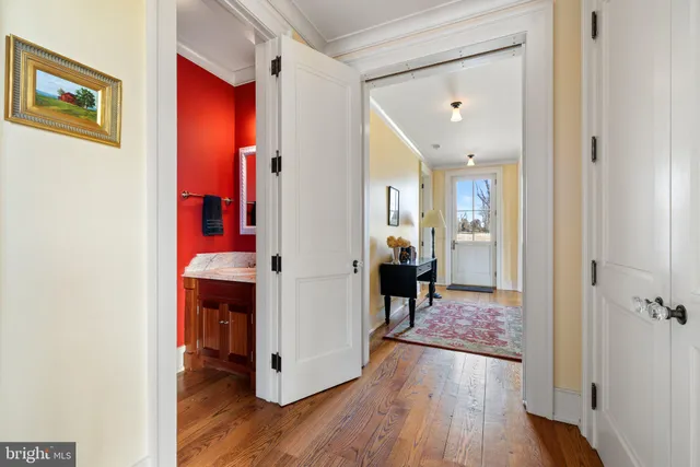 a bathroom with a sink a toilet and a shower