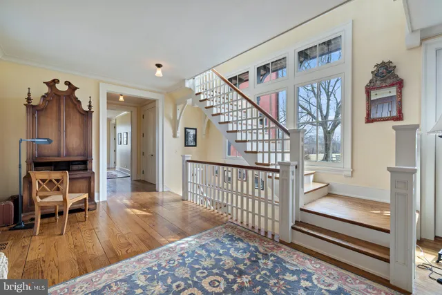 a backyard of a house with outdoor seating
