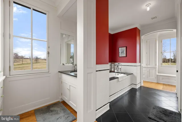 a view of a backyard with swimming pool