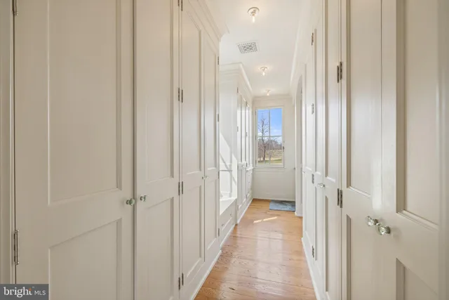 an aerial view of a house with big yard