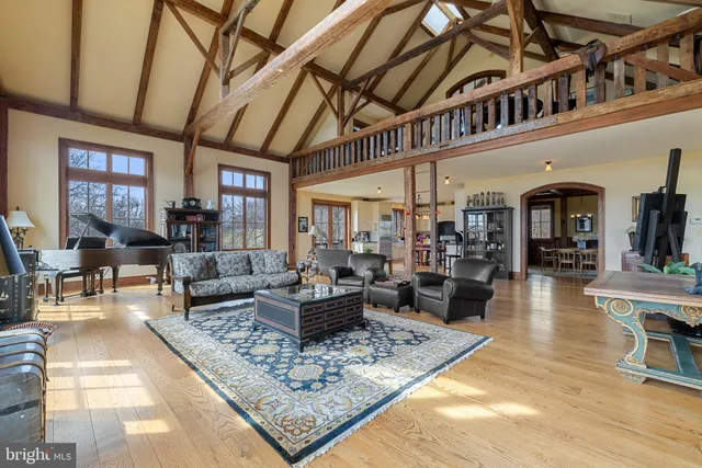 a living room with furniture or couch and a table