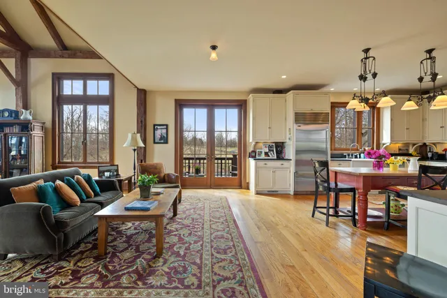 a kitchen with a stove oven and a sink