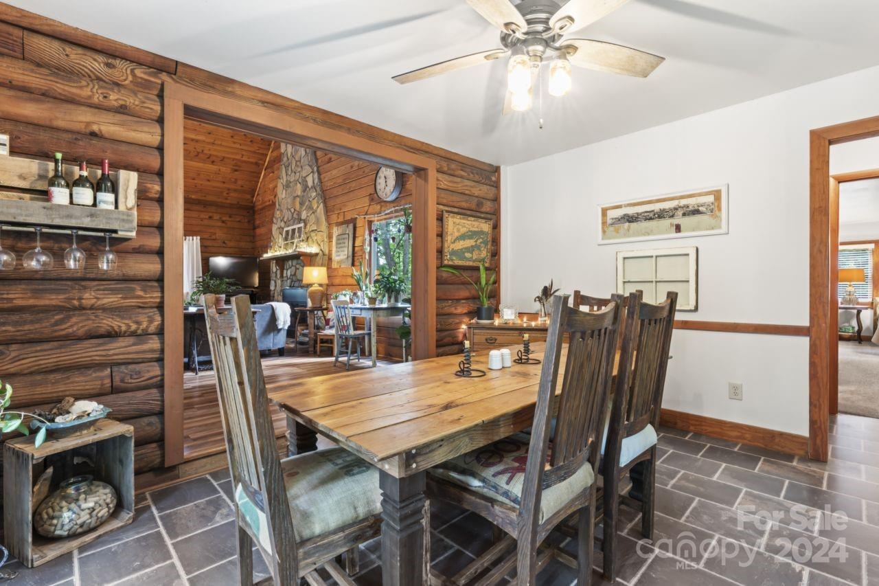 2440 Sloop Road Mount Ulla, NC 28125 - Photo 14 of 48 a view of a dining room with furniture window and outside view