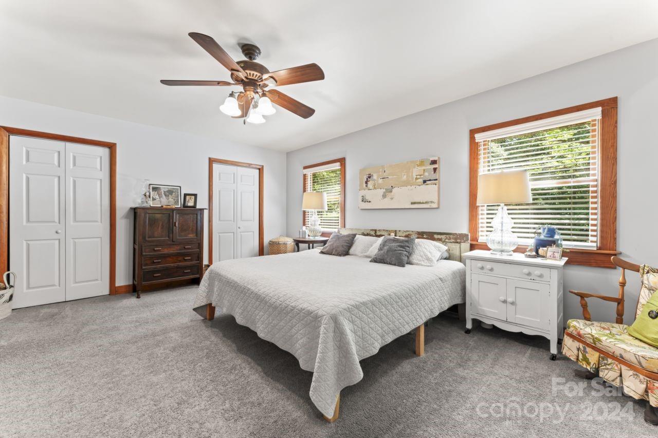 2440 Sloop Road Mount Ulla, NC 28125 - Photo 24 of 48 a bed room with a bed and a window