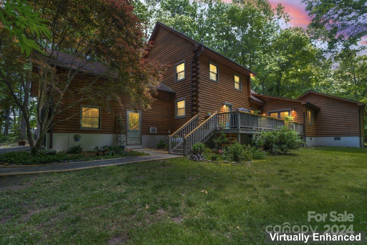 2440 Sloop Road Mount Ulla, NC 28125 - Photo 36 of 48 a front view of a house with a yard