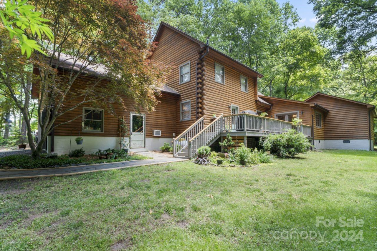 2440 Sloop Road Mount Ulla, NC 28125 - Photo 37 of 48 a front view of a house with a yard