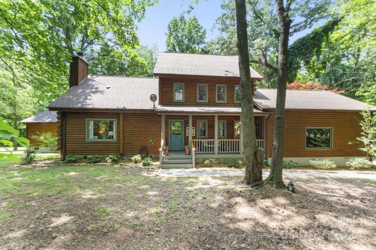 2440 Sloop Road Mount Ulla, NC 28125 - Photo 41 of 48 a view of a house with a yard and large tree