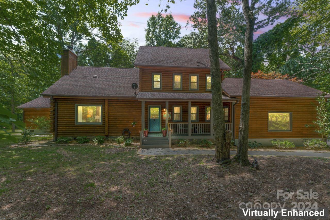 2440 Sloop Road Mount Ulla, NC 28125 - Photo 42 of 48 a front view of a house with yard
