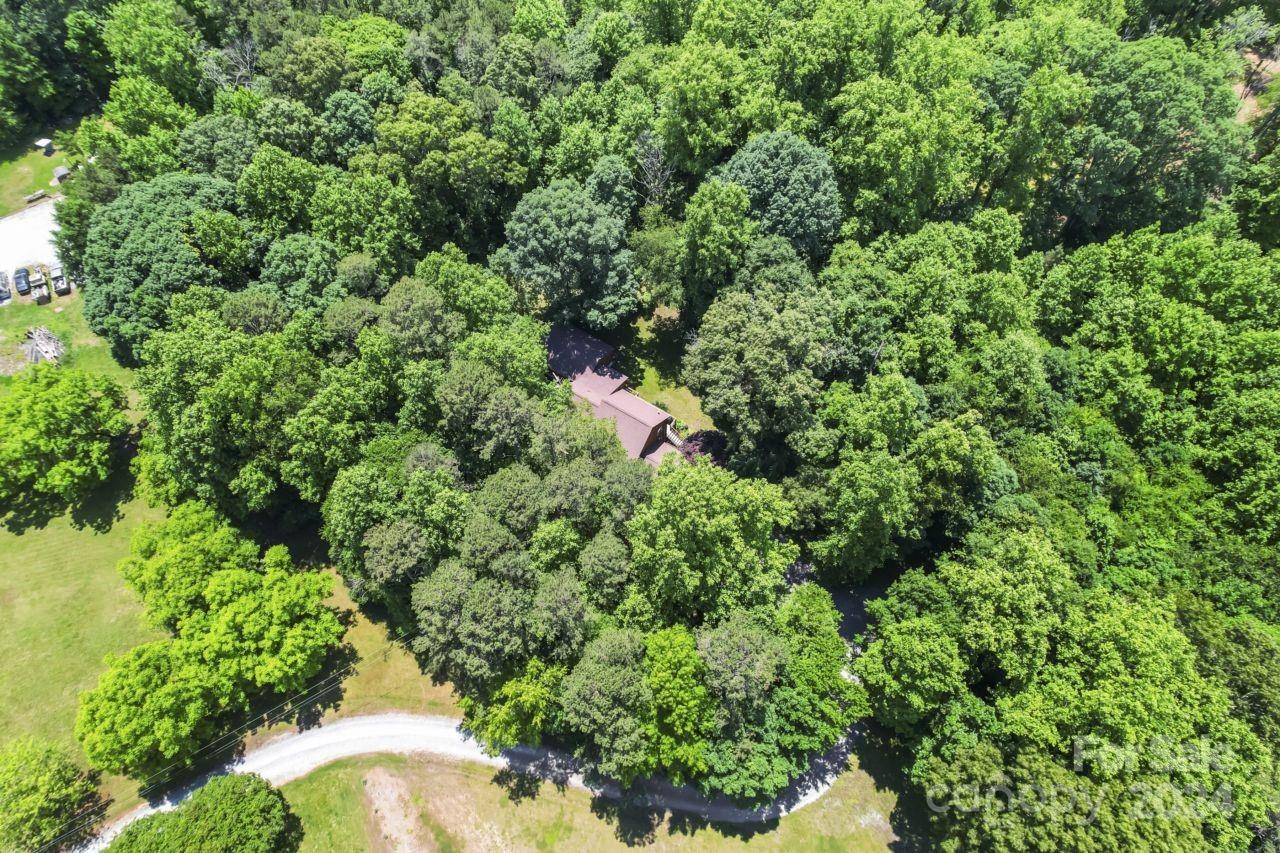 2440 Sloop Road Mount Ulla, NC 28125 - Photo 43 of 48 an aerial view of residential house with outdoor space and trees all around