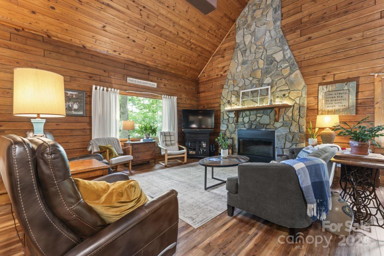 2440 Sloop Road Mount Ulla, NC 28125 - Photo 10 of 48 a living room with furniture fireplace and a large window