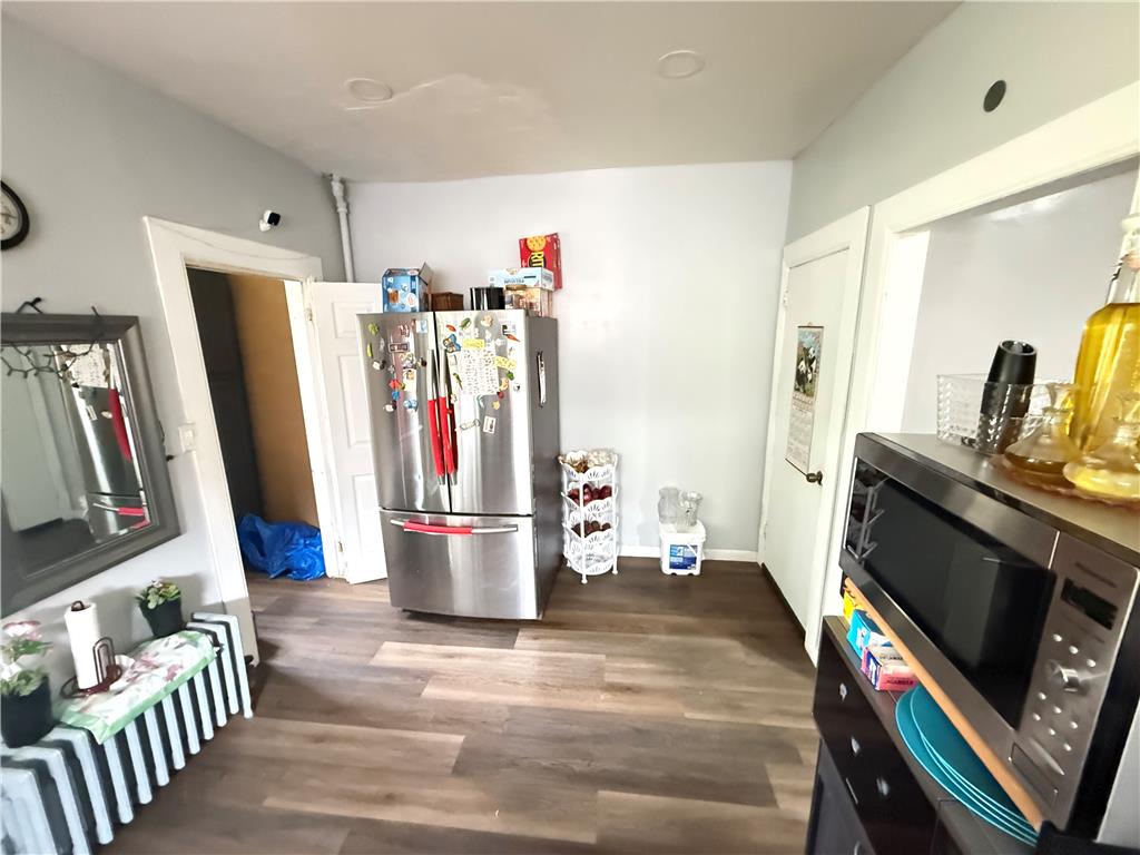 700 Philo Street Scranton, PA 18508 - Photo 8 of 19 Functional kitchen with dark wood flooring and ample space for meal preparation.