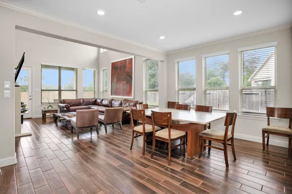 a living room with furniture fireplace and flat screen tv