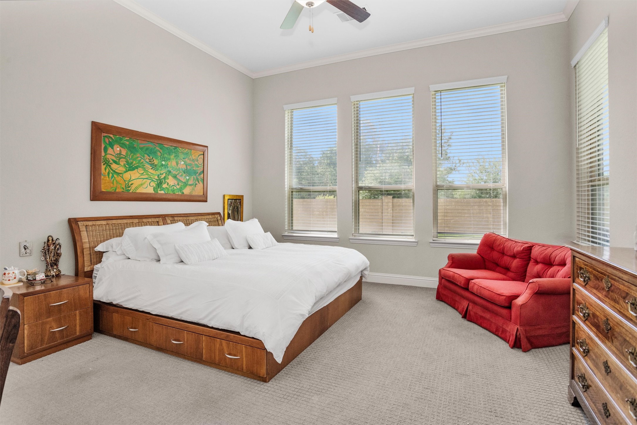 7451 Bethpage Lane Spring, TX 77389 - Photo 15 of 31 a bed sitting in a bedroom next to a window