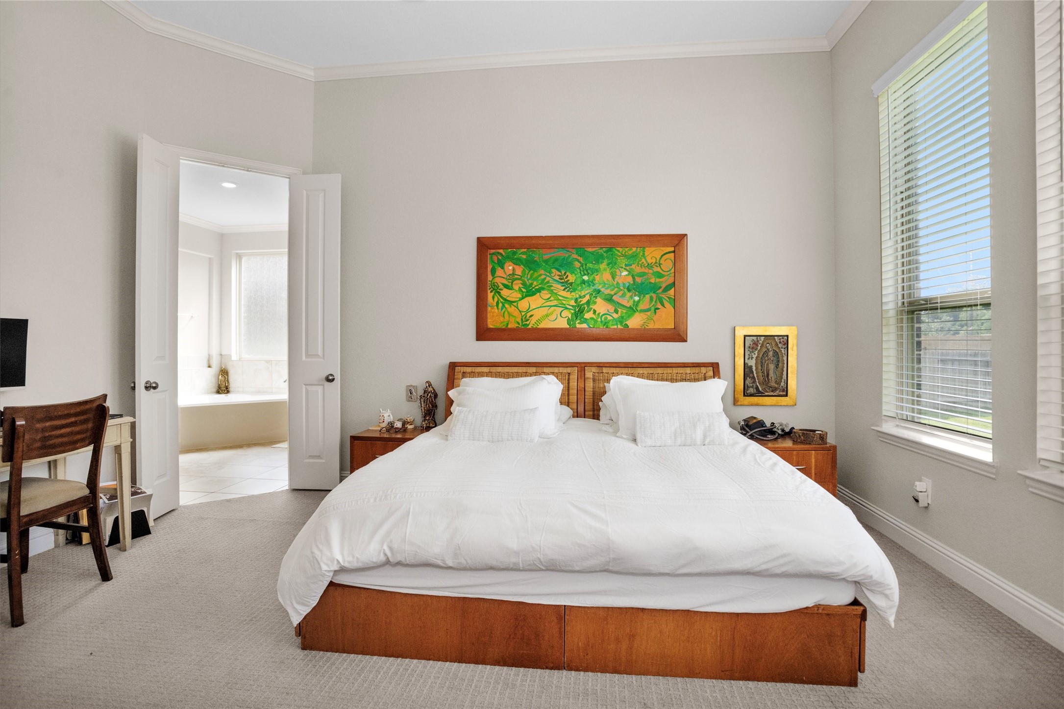 7451 Bethpage Lane Spring, TX 77389 - Photo 16 of 31 a bedroom with a bed and chair