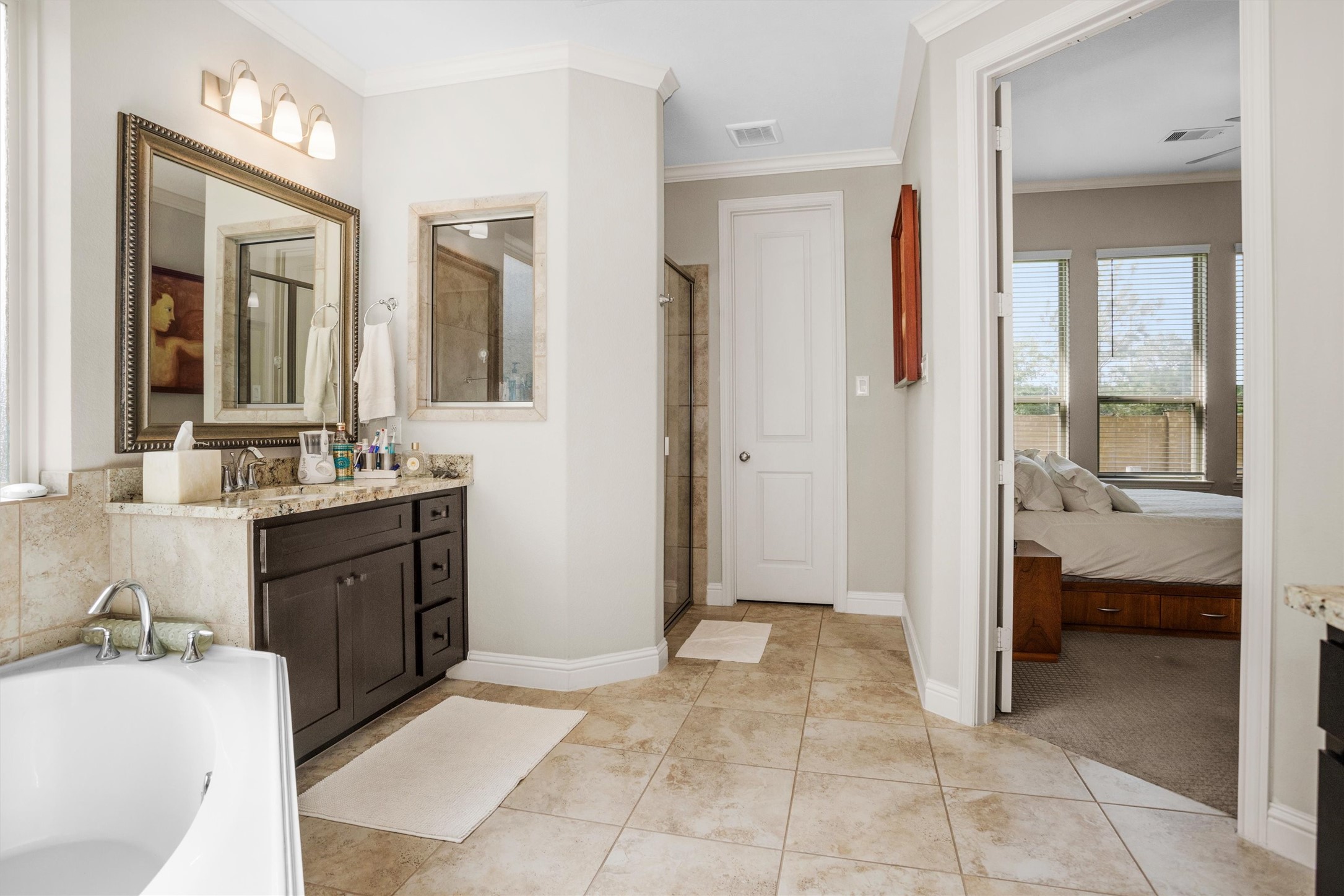 7451 Bethpage Lane Spring, TX 77389 - Photo 18 of 31 a bathroom with a sink and a mirror
