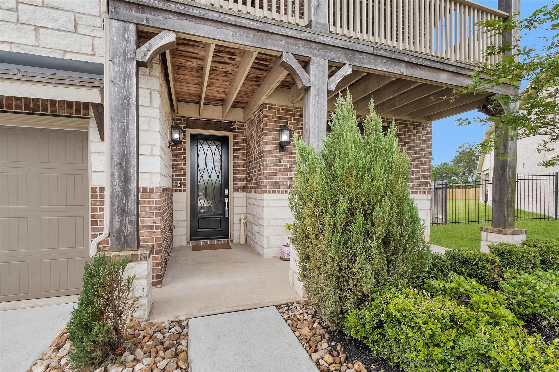 7451 Bethpage Lane Spring, TX 77389 - Photo 2 of 31 a view of a porch