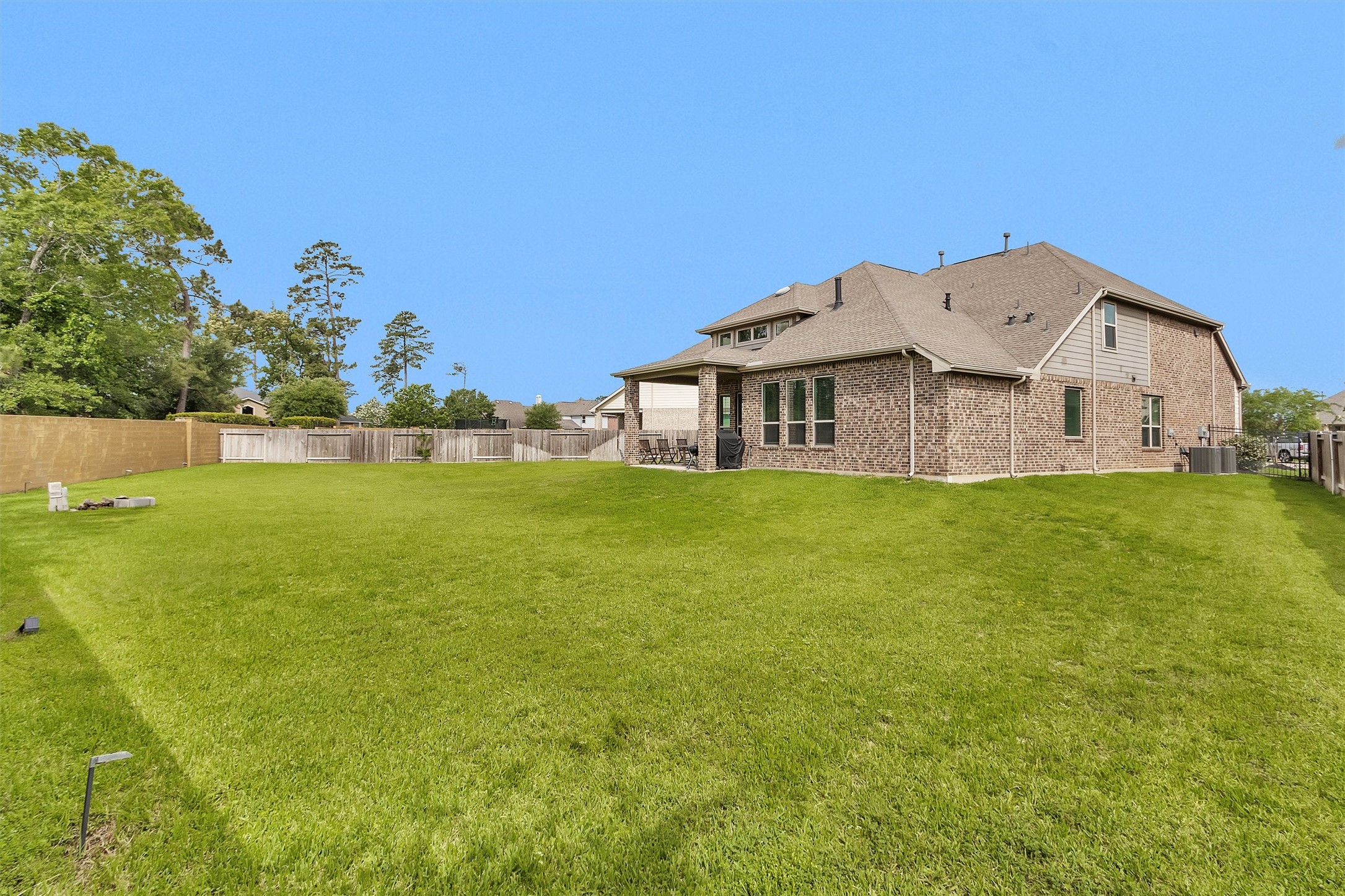 7451 Bethpage Lane Spring, TX 77389 - Photo 30 of 31 a front view of a house with garden
