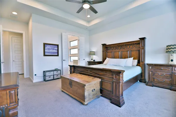 a kitchen with granite countertop a sink stainless steel appliances and cabinets