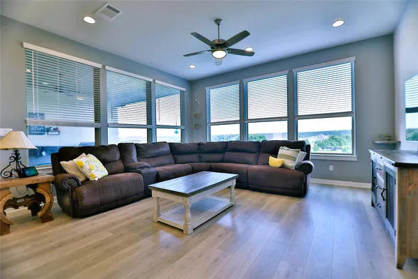 a bathroom with a double vanity sink mirror and shower
