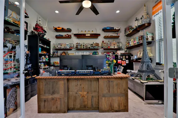 a bedroom with a bed and a chair