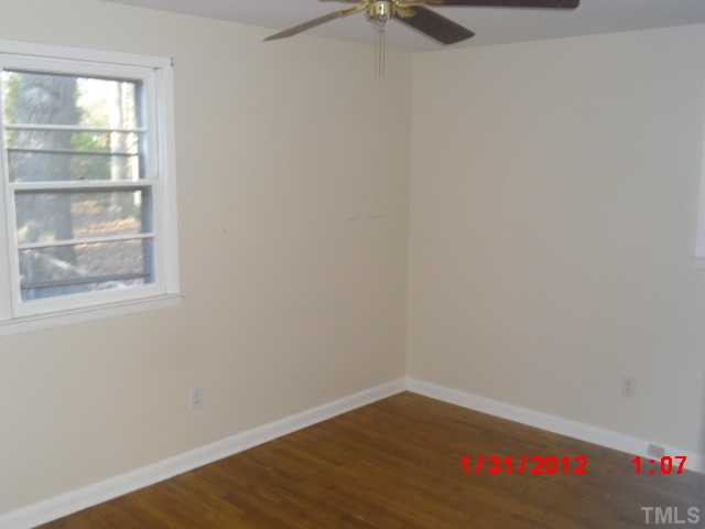 2105 Oakview Court Raleigh, NC 27604 - Photo 4 of 6 a room with a window