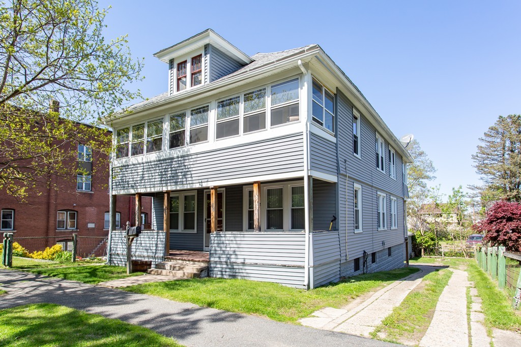 38-40 Rapalus Street Springfield, MA 01151 - Photo 21 of 25 a front view of a house with a yard