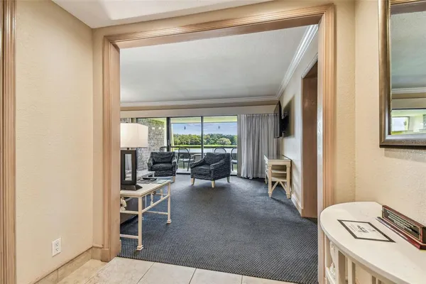 a view of a livingroom with chairs
