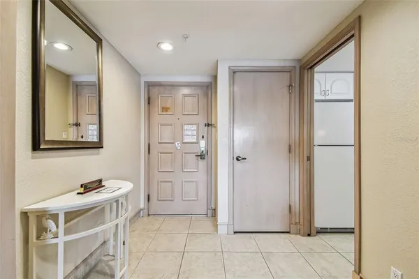a kitchen with stainless steel appliances granite countertop white cabinets and sink