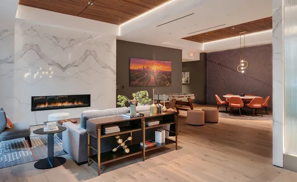 a view of gallery with wooden floor