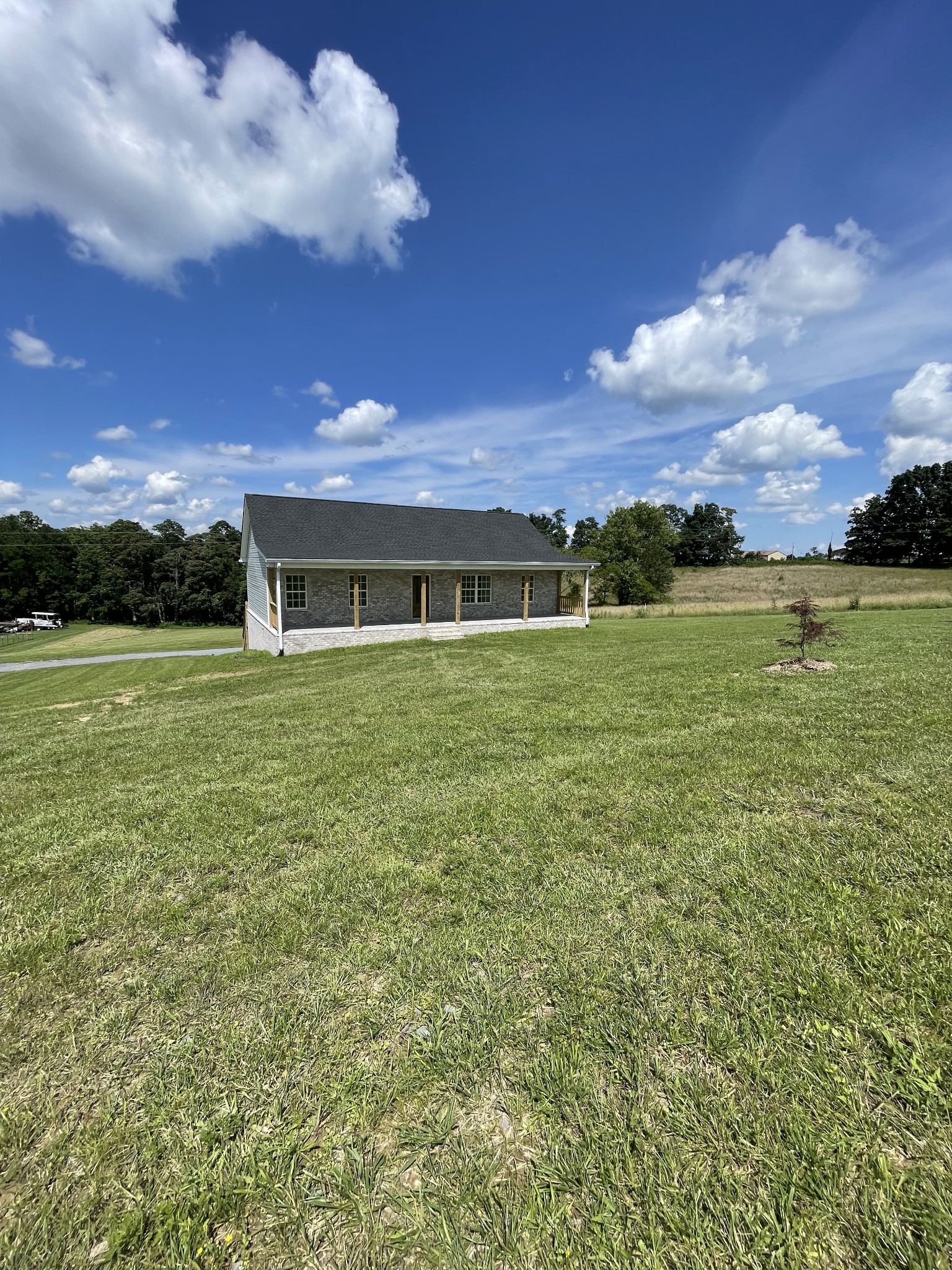 2907 Union Camp Road Lafayette, TN 37083 - Photo 1 of 24 a view of a house with a yard