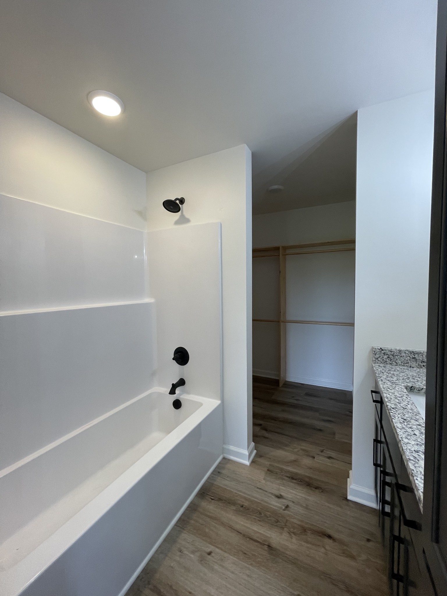 2907 Union Camp Road Lafayette, TN 37083 - Photo 14 of 24 a bathroom with a tub and a shower