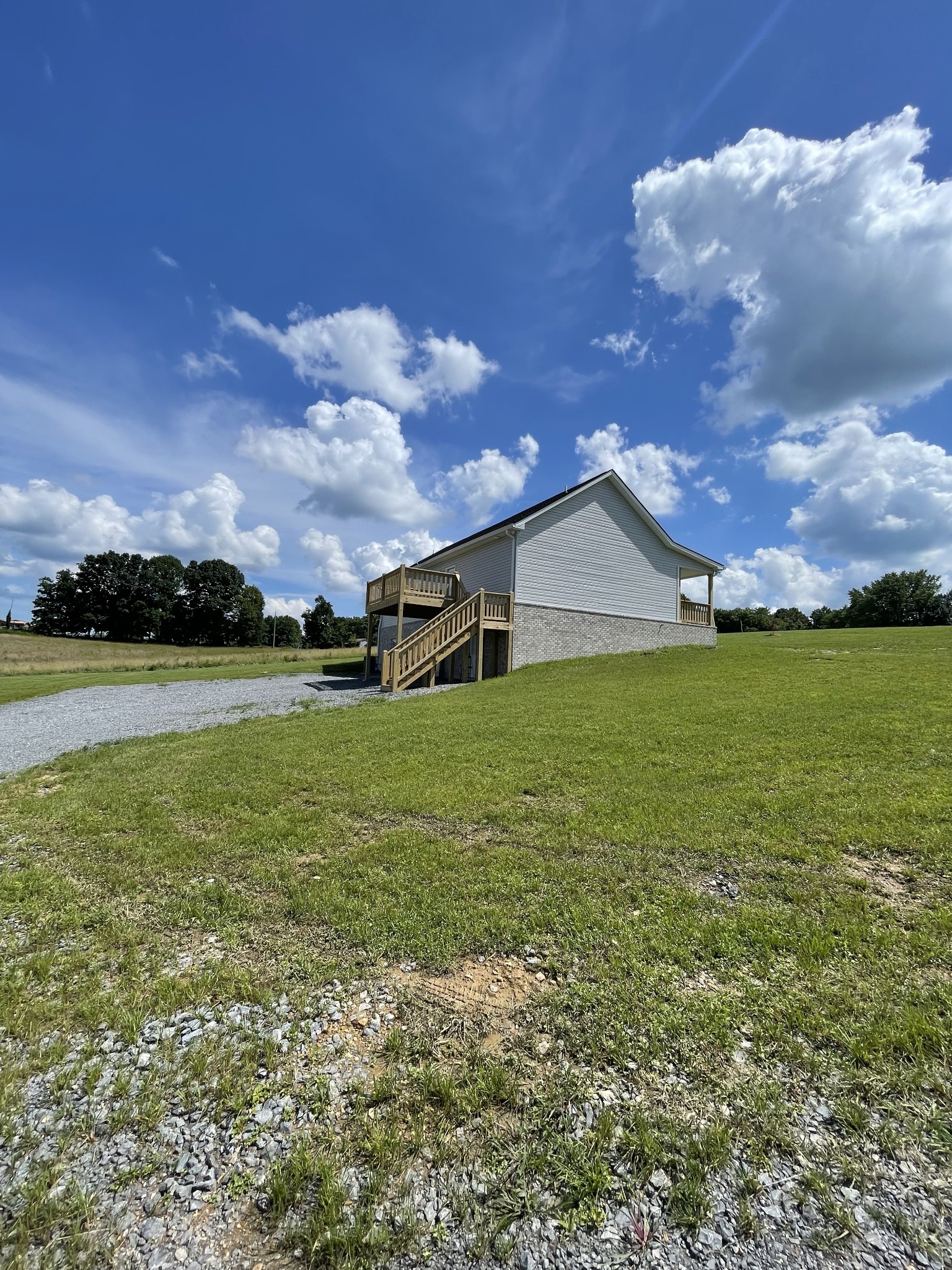 2907 Union Camp Road Lafayette, TN 37083 - Photo 5 of 24 a house view with swimming pool and garden space