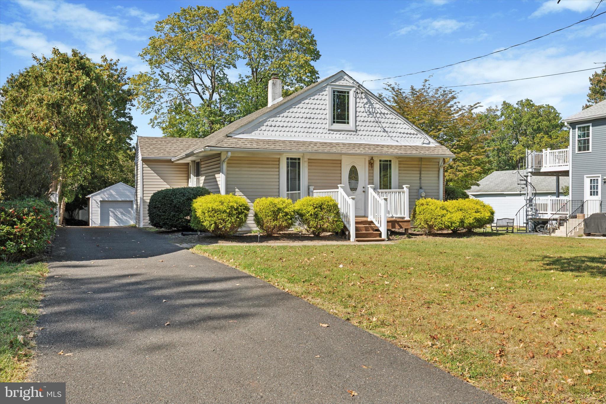 756 Churchville Road Southampton, PA 18966 - Photo 1 of 19 a front view of house with yard and trees around