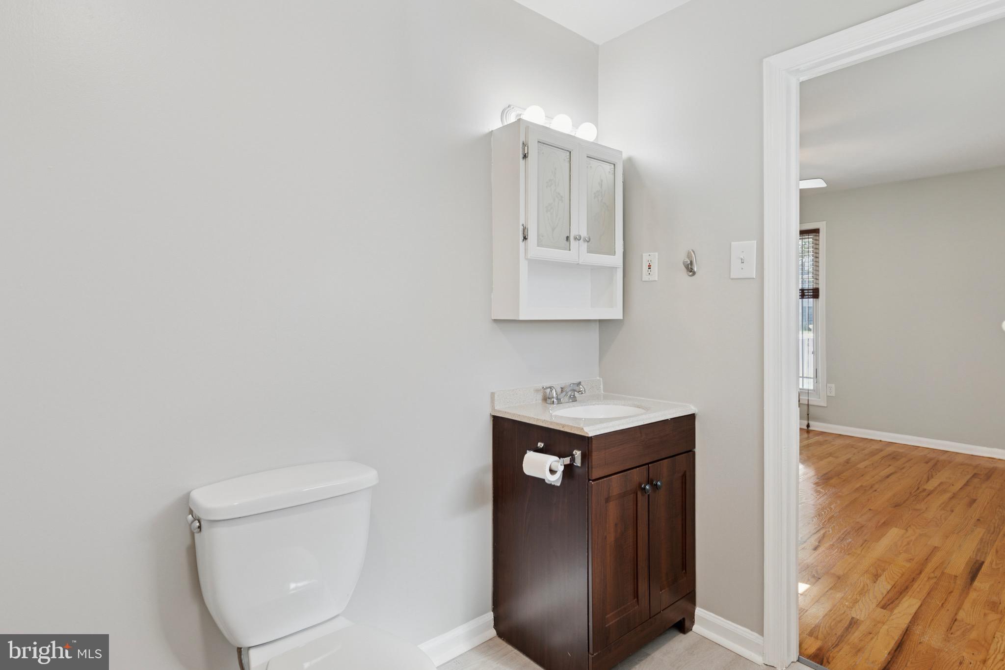 756 Churchville Road Southampton, PA 18966 - Photo 14 of 19 a bathroom with a toilet a sink and mirror