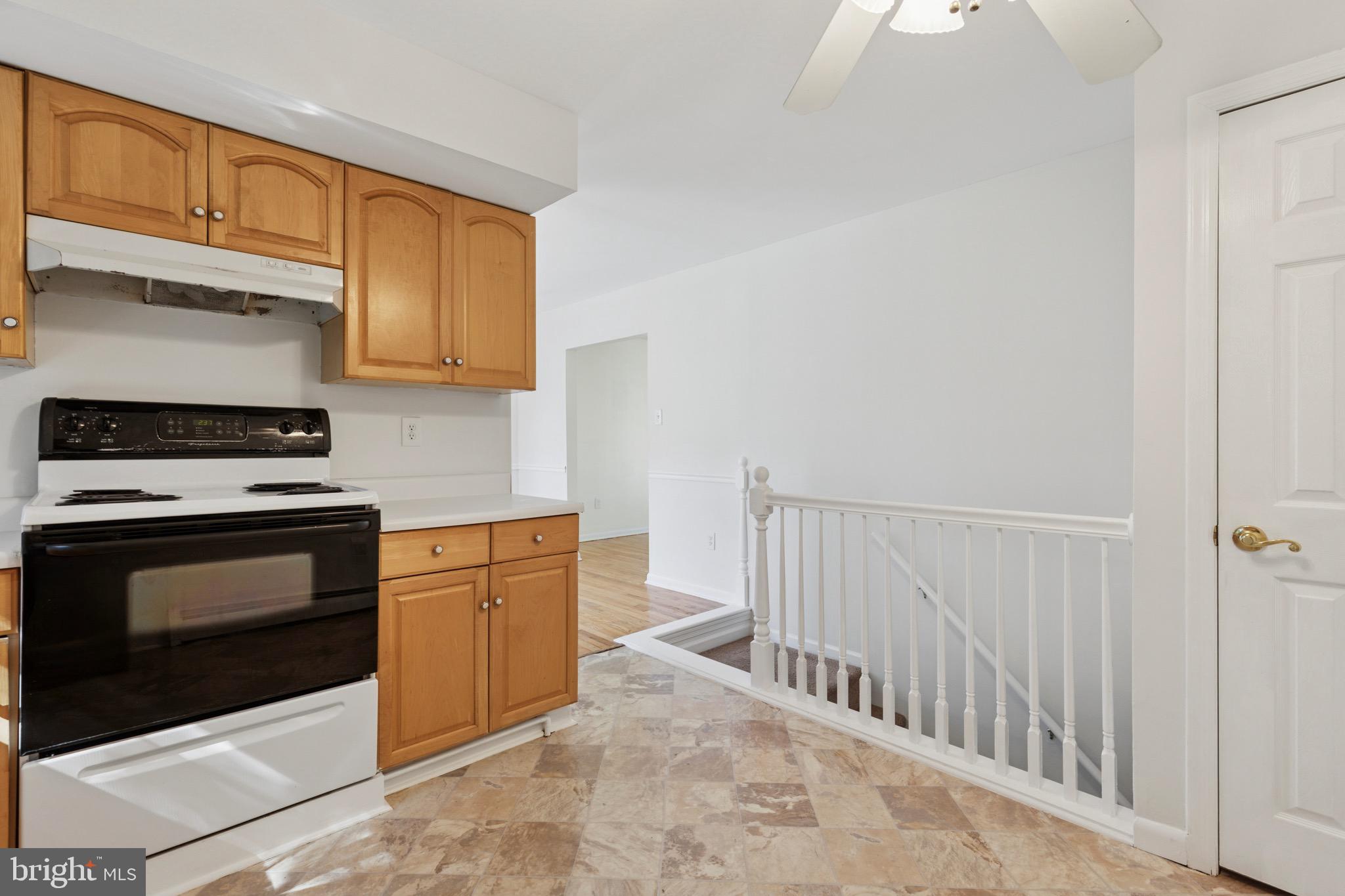 756 Churchville Road Southampton, PA 18966 - Photo 6 of 19 a kitchen with granite countertop white cabinets and stainless steel appliances